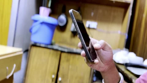 Using Mobile Phone in Office Workspace 스톡 동영상 336177941