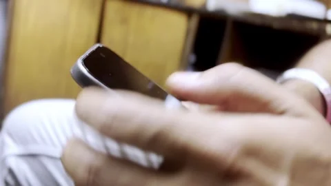 Using Mobile Phone in Office Workspace Video stock 336177950