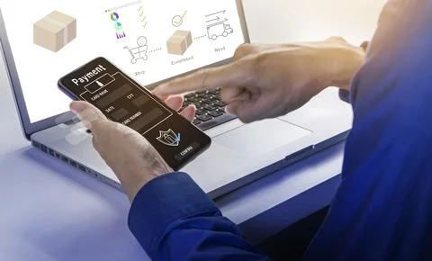 Using mobile phones to pay for goods and services via mobile devices, loggi.. Stock Photos