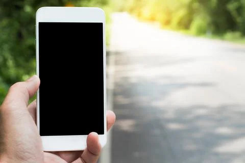 Using mobile smart phone search location on satellite navigation applicatio.. Stock Photos