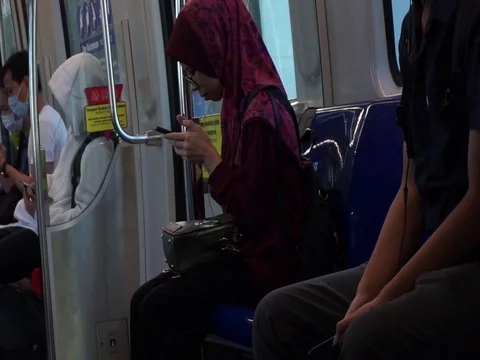 Using mobile in train Stock Footage 126475349