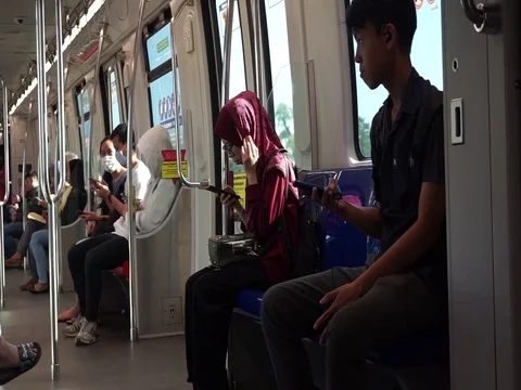 Using mobile in train Stock Footage 126475402