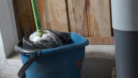 Using a mop bucket Stock Footage 277439706