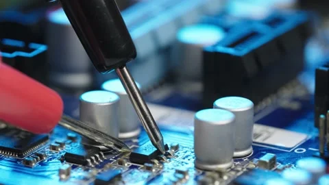 Using a multimeter to measure the electrical current in computer Stock Footage 169956071
