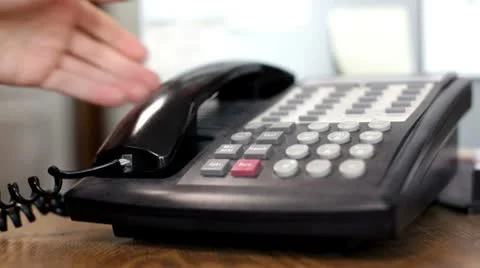 Using office phone Vídeos de archivo 8931074