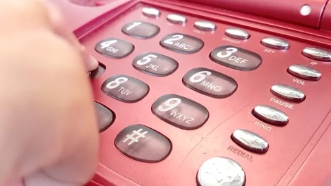 Using an old home phone with color maroon Stock Footage 149709657