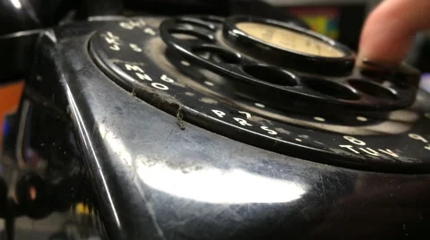 Using old rotary telephone dialing number Stock Footage