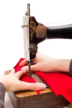 Using an old sewing machine Stock Photos