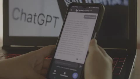Using Open AI Chat GPT on a mobile device. Close up. Stock Footage 241719317