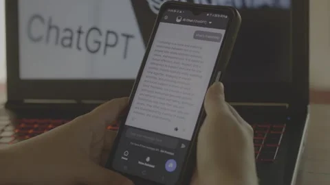 Using Open AI Chat GPT on a mobile device. Close up. Stock Footage 241719651