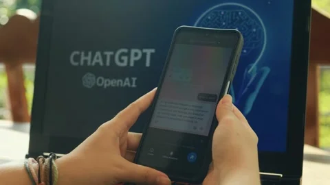 Using Open AI Chat GPT on a mobile device. Close up. Stock Footage 241719730