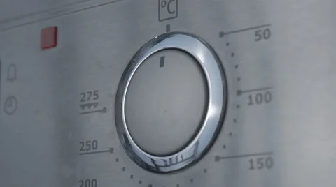 Using the Oven, oven temperature control closeup Stock Footage 43224585