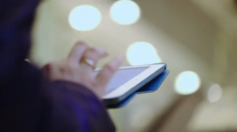 Using pad while moving up on escalator Stock Footage 39431633