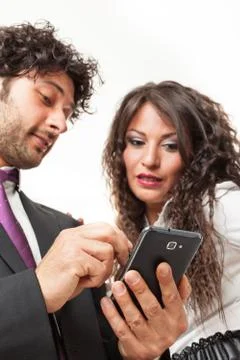 Using a palmtop device Stock Photos