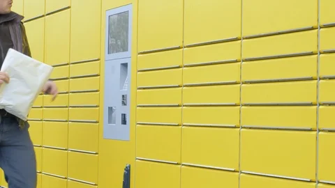 Using a parcel station in germany Stock Footage 97406304