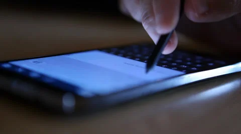 Using Pen to Write Email on Smart Phone Stock Footage 38869310