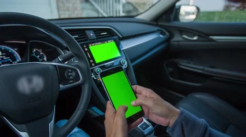 Using phone and touchscreen navigation in car Stock Footage 66207095