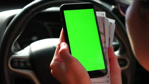 Using phone at car Stock Footage 251937178