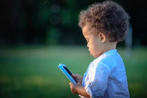 Using phone from an early age Stock Photos