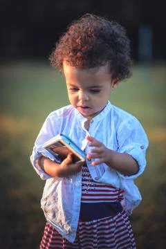 Using phone from an early age Stock Photos