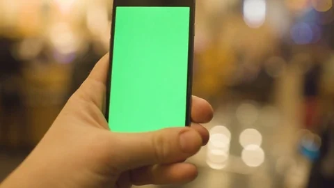 Using Phone with Green Screen In Cafe. Shot on RED Cinema Camera in 4K (UHD Stock Footage 73839587