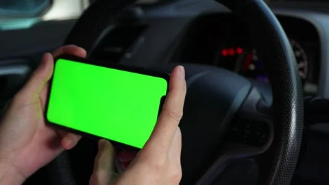 Using phone green screen at car 動画素材 249861524
