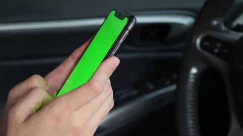 Using phone green screen at car Stock Footage 249861533
