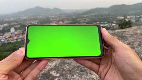 Using phone with green screen horizontal cityscape panoramic view sky Видео 180310724
