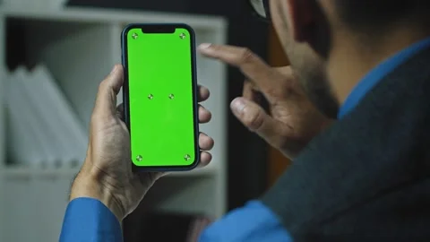 Using Phone with Green Screen In office Stock Footage 164766705