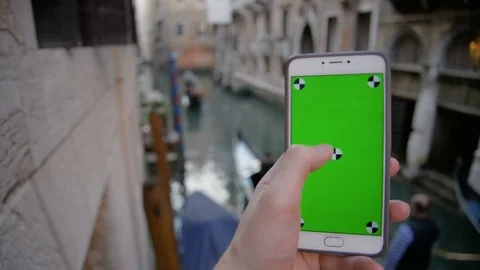 Using Phone with Green Screen In Venice Stock Footage 75823646