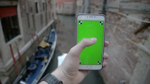 Using Phone with Green Screen In Venice Stock Footage 76824210