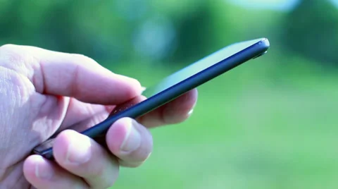 Using Phone In Nature 4 Stock Footage 39385650