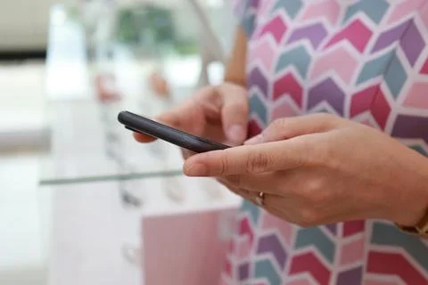 Using phone Stock-Fotos