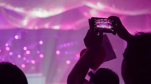 Using phone record live concert slowmotion 100fps Video stock 156045892