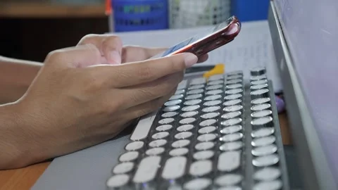 Using the phone at work Stock Footage 243419924