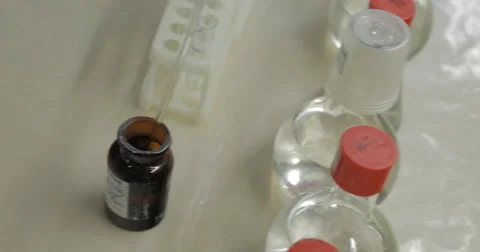 Using Pipette For Taking Samples From Test Tube (4K) Stock Footage 61388821