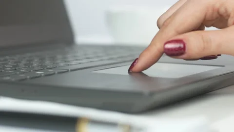 Using the pointing device on a laptop Stock Footage 270360620