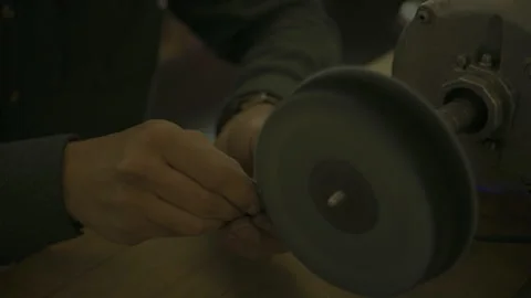 Using a polishing machine on a ring Stock Footage 253304702