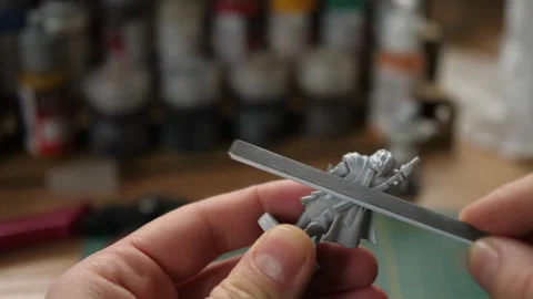 Using polishing sanding stick, painting minis, miniatures for rpg game Stock Footage 260825246