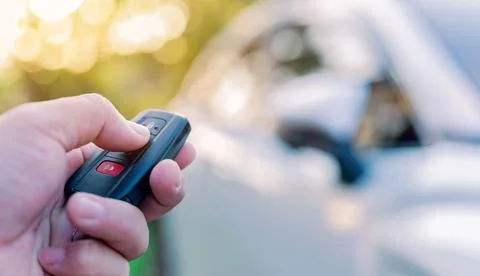 Using remote control for open and lock the car door. 스톡 사진