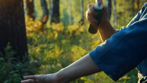 Using repellent on nature Video stock 80975473