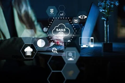 Using Saas to manage software applications in a dark office setting Stock Photos