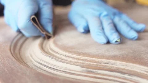 Using sandepaper to restore old wooden furniture slow motion Stock Footage 78939621