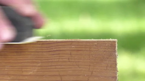 Using a sanding block on the edge of a board Video stock 63506444