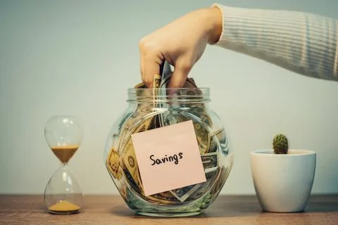Using saved up money from the bank Stock Photos