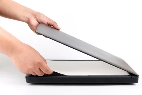 Using scanner in office, close-up of hands scanning documents Foto stock