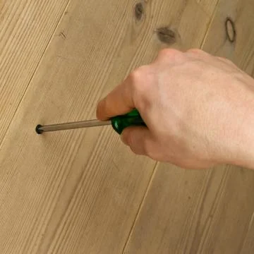 Using a screwdriver Stock-Fotos