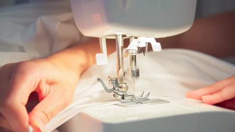 Using sewing machine 1 Stock Footage 121182546