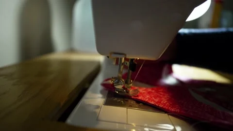 Using a sewing machine to stitch together a quilt block - isolated close up Stock Footage 167623740