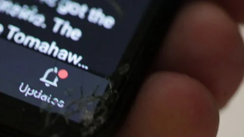 Using shattered phone screen Stock Footage 228691403